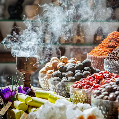 Spices and herbs with smoke in a market setting